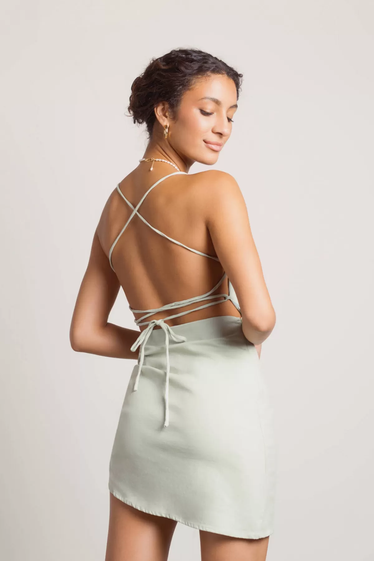 Tobi Moving On Cross Back Asymmetrical Mini Dress - Sage* Wedding Guest Dresses Under $50 | Wedding Guest Dresses